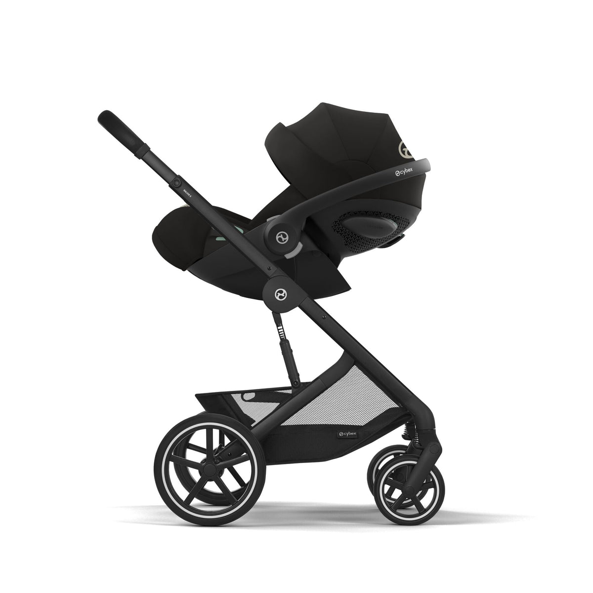 Black stroller side view with canopy and ventilated seat panel