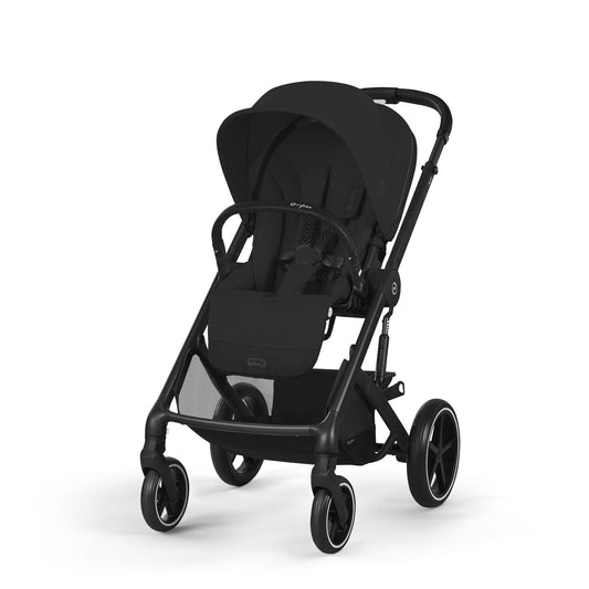 Black stroller with reversible seat, front wheels, and canopy