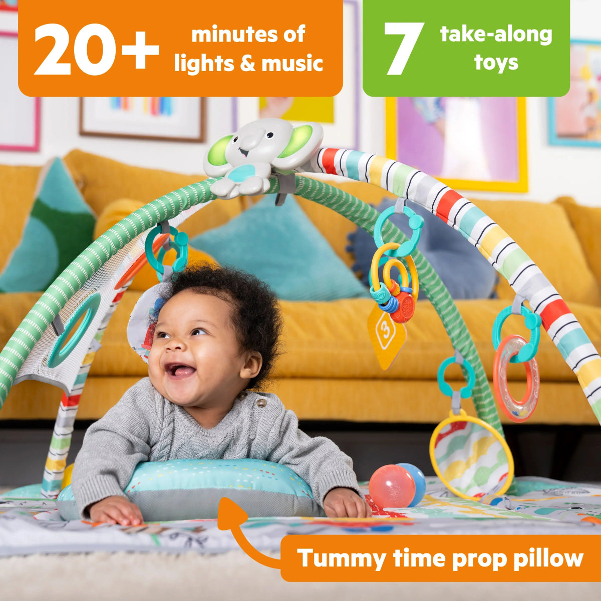 Baby activity gym with hanging toy arch and tummy-time prop pillow