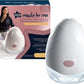 White portable wearable electric breast pump with pink button and textured shell