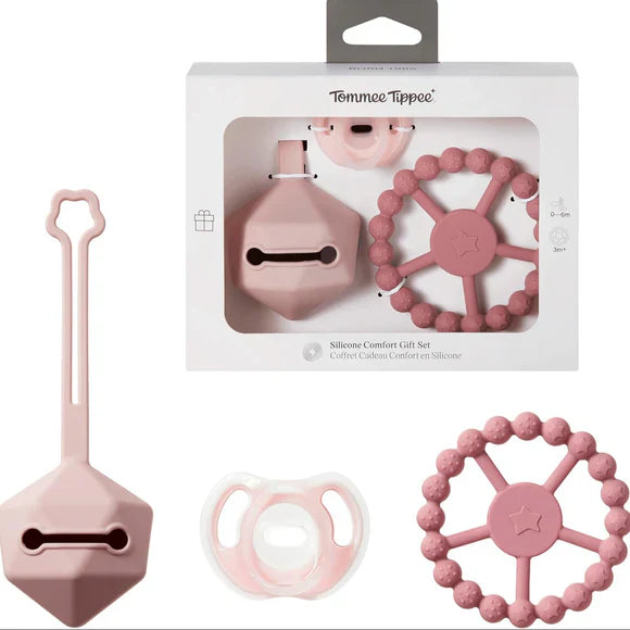 Pink silicone baby comfort set box with teether ring, soother and handled accessory
