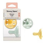 Breast-like pacifier set, yellow and green silicone shields, 0–6 months (Tommee Tippee).