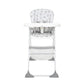 White highchair with light gray icon-pattern seat and back, padded tray and legs.