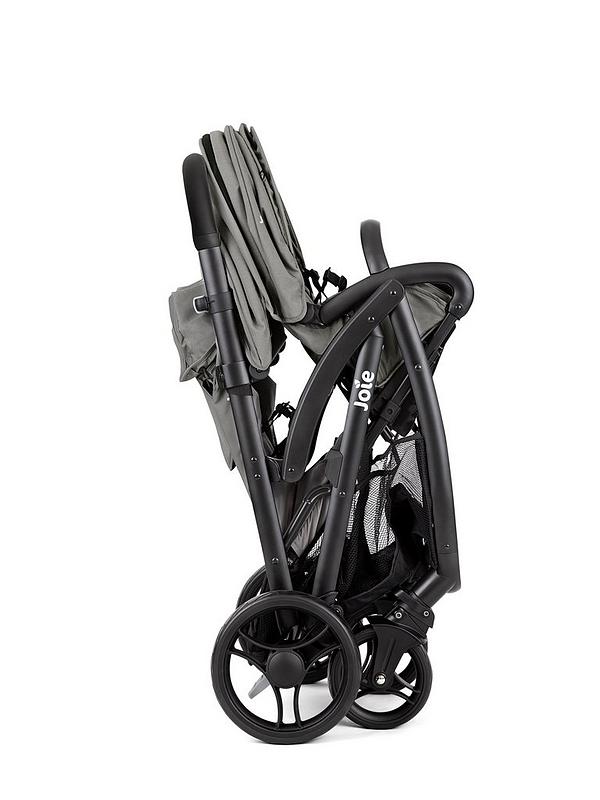 Double stroller with black frame and gray seat covers, rear angled view