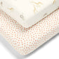 Cotbed fitted sheet corner with jungle animal print and elastic fitted edge