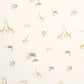 Cotbed fitted sheet fabric with jungle animals print on light cream background