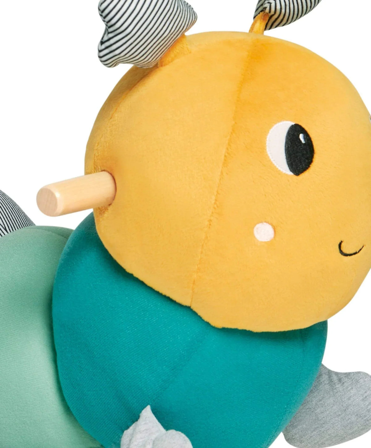 Stuffed caterpillar rocking toy close-up of yellow head with striped antenna
