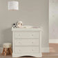 White nursery dresser changer with three drawers and curved top rail