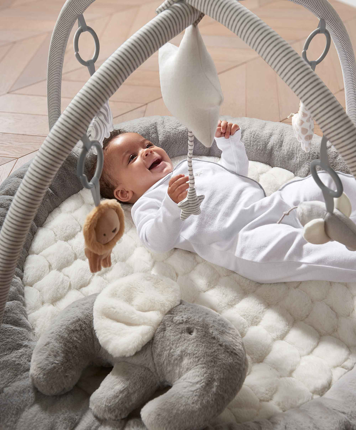 Elephant playmat gym floor mat with hanging toys and plush elephant in gray and white