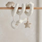 Spiral activity toy with hanging stars and duck plush, off-white fabric