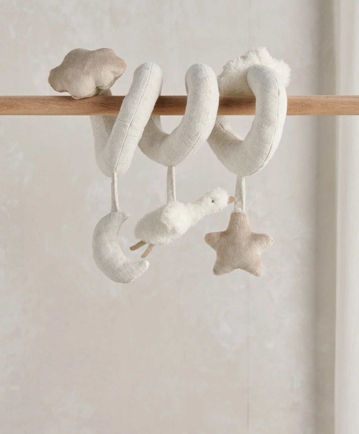 Spiral activity toy with hanging stars and duck plush, off-white fabric