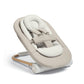 Beige cashmere baby bouncer seat, padded headrest and safety harness
