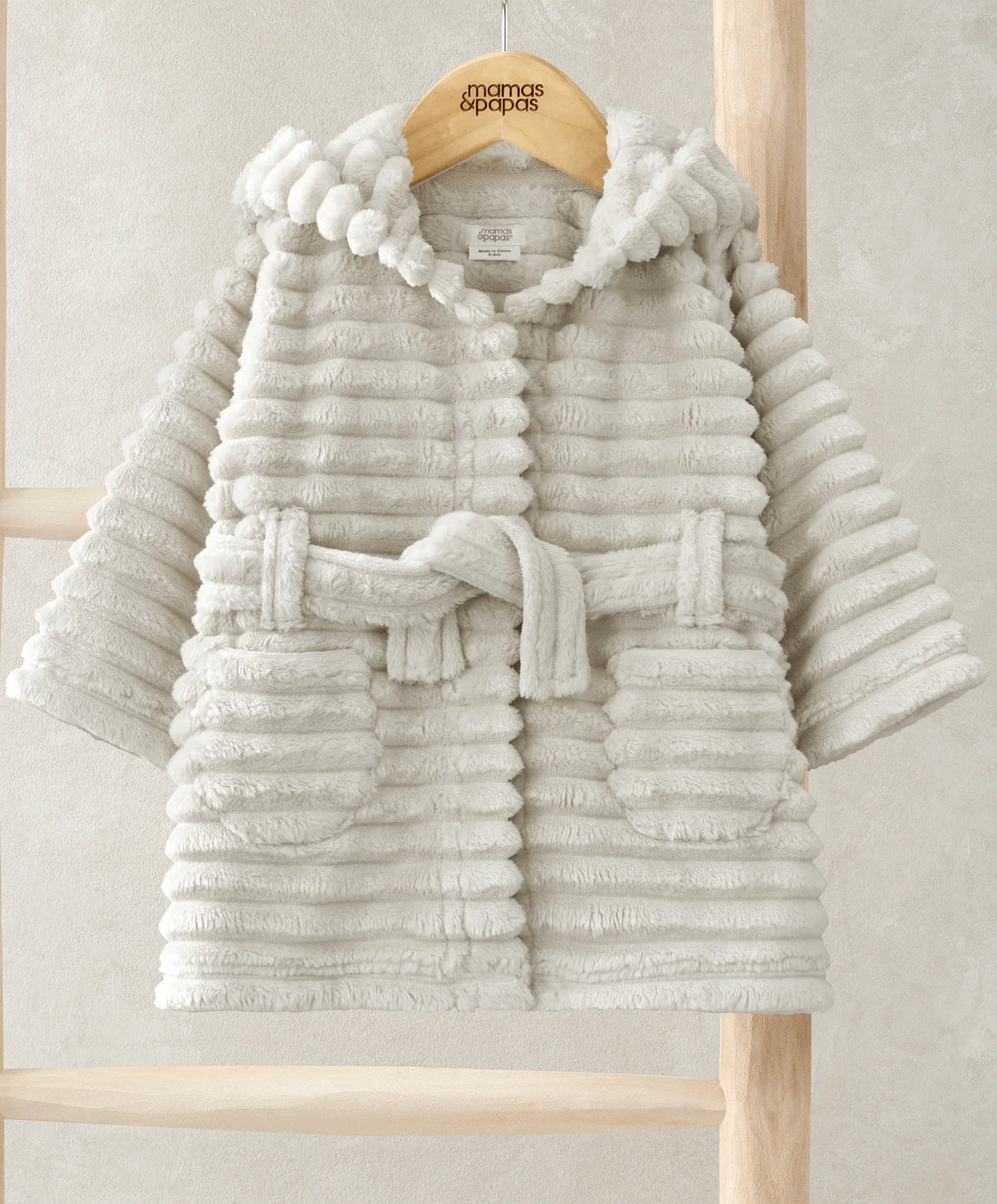 Bear dressing gown in cream plush, striped texture, hood with pom details, tie belt