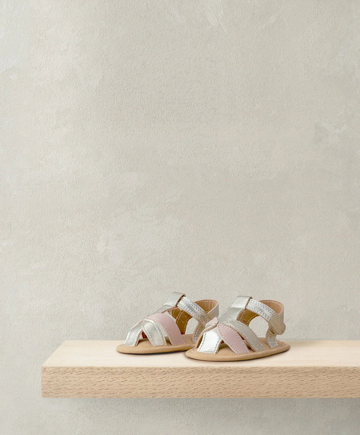 Metallic open-toe sandals with two hook-and-loop straps and cushioned footbed