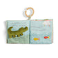 Baby cloth activity book open to dinosaur and fish scenes on fabric pages