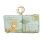 Cloth activity book open to lion and birds scenes with soft illustrated pages