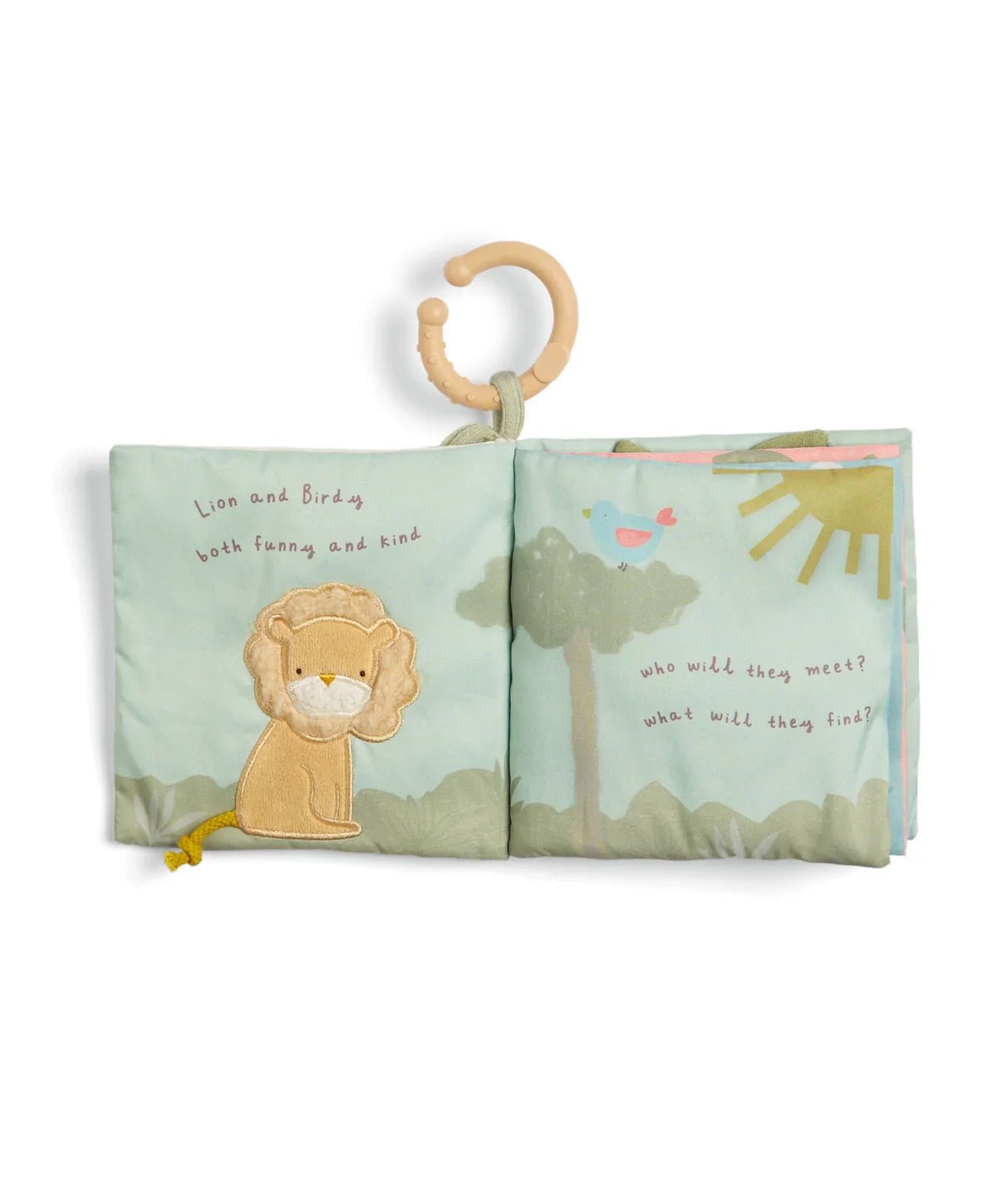 Cloth activity book open to lion and birds scenes with soft illustrated pages
