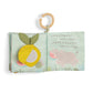 Cloth activity book open to duck and cloud scenes with felt fabric page detail