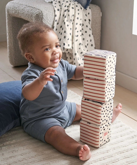 Mamas & Papas x Another Fox fabric folding cubes with red stripes and black-dot pattern