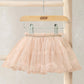 Pink sparkle mesh tutu skirt with metallic waistband and gathered tulle layers