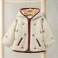 Cream hooded borg jacket with front zip and burgundy trim, embroidered cherry accents