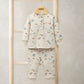 Kids cream pajama set with rodeo-style animal print, long sleeves and pants