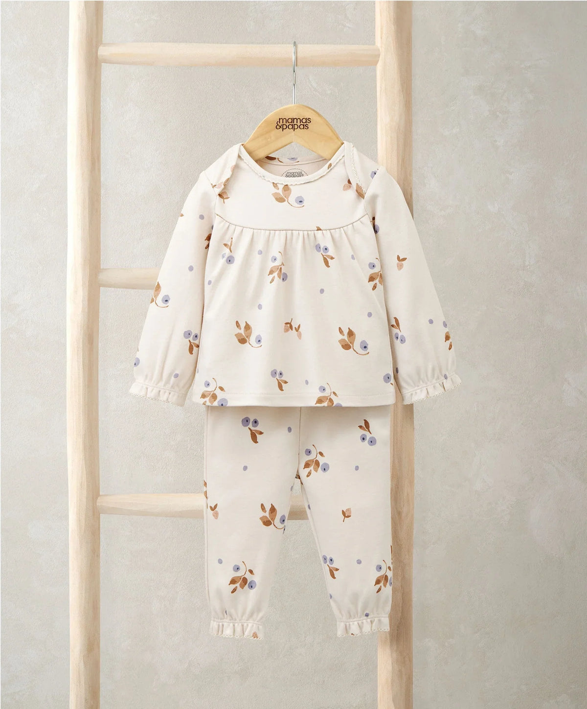 Pyjama set with berry print: cream long-sleeve top and matching jogger pants