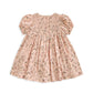 Pink ditsy floral dress with smocked yoke, puff sleeves and flared gathered hem