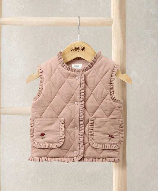 Pink cord quilted gilet with diamond stitching, snap buttons, and two front pockets