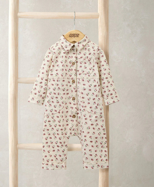 Cream floral twill boiler suit with long sleeves, button front and stand collar