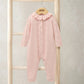 Pink knitted romper with frill collar, button front and long sleeves