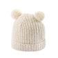 Rib knit beanie with knit pom poms, oatmeal beige, folded cuff