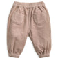 Pink cord trousers, front view, elastic waist with two patch pockets