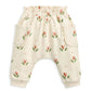 Cream floral joggers with tulip print, drawstring-style waist, side patch pockets