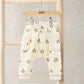Floral joggers in cream with scattered tulip prints, elastic waist and cuffs