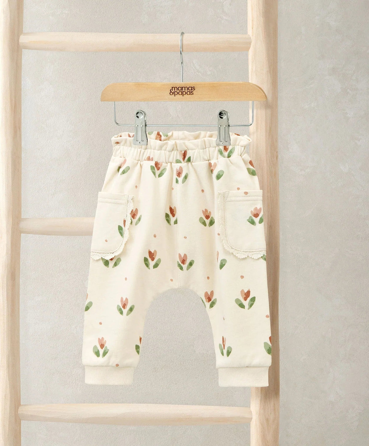 Floral joggers in cream with scattered tulip prints, elastic waist and cuffs