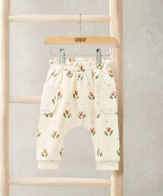 Floral joggers in cream with scattered tulip prints, elastic waist and cuffs