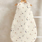 Cream sleep bag with planet print, sleeveless with wide shoulder openings