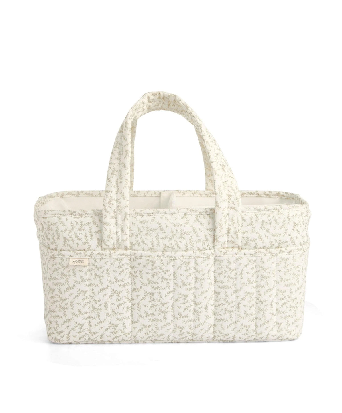 Beige leaf-pattern nappy caddy with wide handles and structured interior base