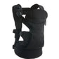 Black baby carrier with padded head support and adjustable straps, back-side view