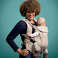 Cashmere baby carrier, beige, front-facing with padded shoulder straps and leg support