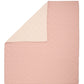 Reversible baby quilt, light pink front with subtle circular quilting pattern