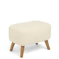 Off-white boucle ottoman with padded top and wooden legs