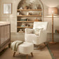 Off-white boucle nursing chair with matching ottoman, rocking base and curved arms