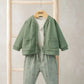 Green button jacket with pockets and green gingham trousers set with white bodysuit.