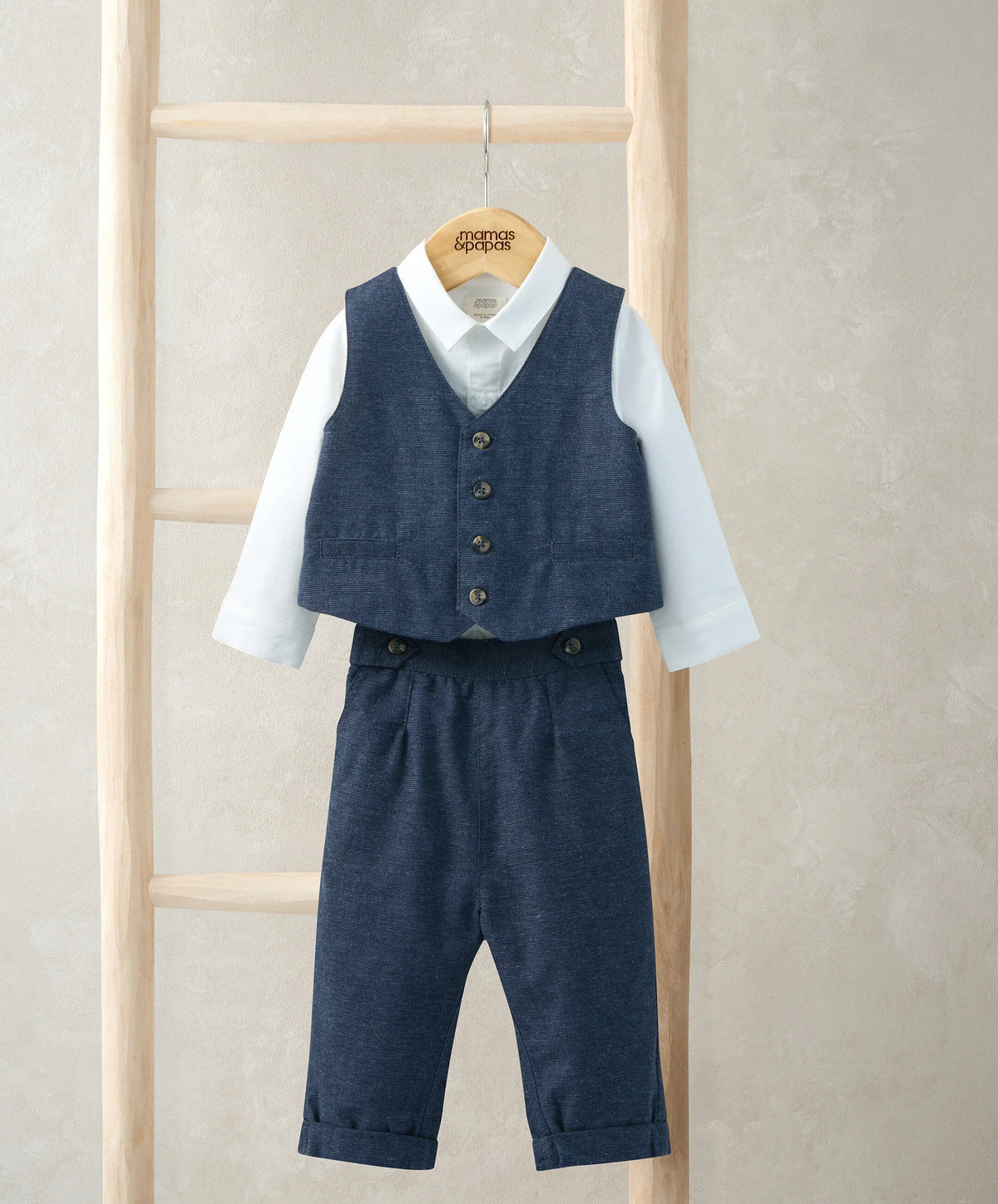 Navy 3-piece suit set: navy vest over white shirt, matching trousers