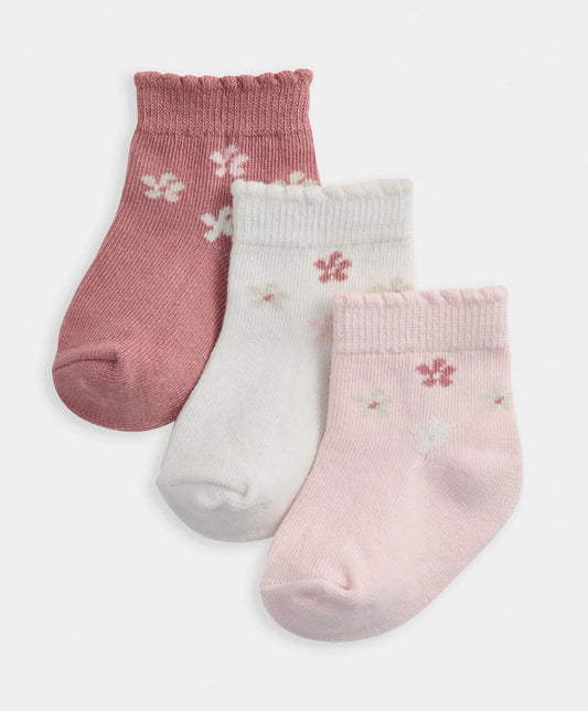 Pack of three floral crew socks: dusty rose, white, and pale pink