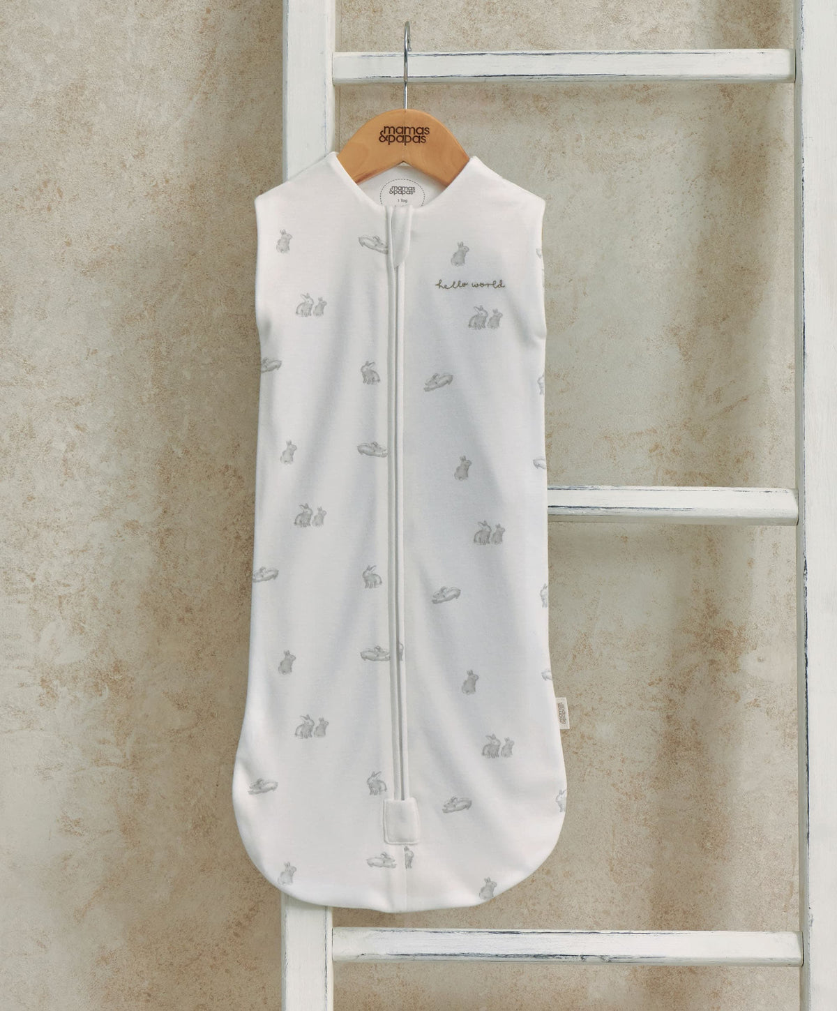 Bunny-print baby sleeping swaddle bag with full-length zip, white