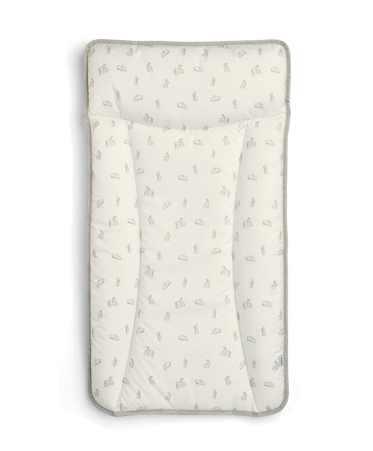 Bunny-print changing mattress with fitted cover, light cream color and padded edges