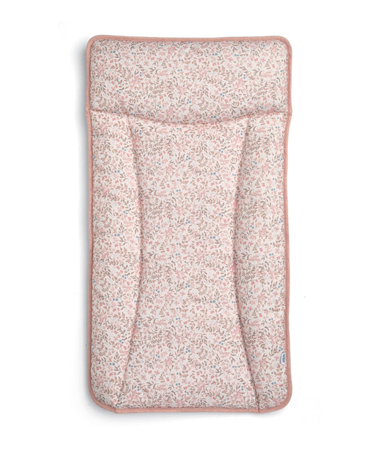 Changing mattress with pink strawberry pattern fabric cover, padded edges